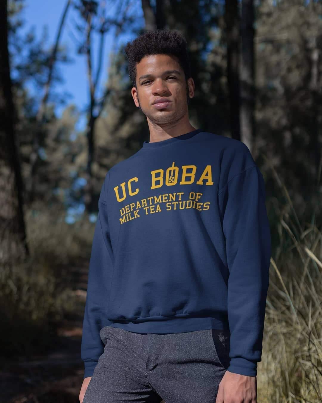Man wearing a UC Boba Sweater in front of a Forest - Boba Shirt