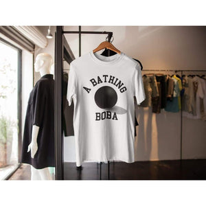 A Bathing Boba Shirt hanging out on a hanger 