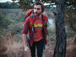 Hiking man wearing a red milk tea shirt
