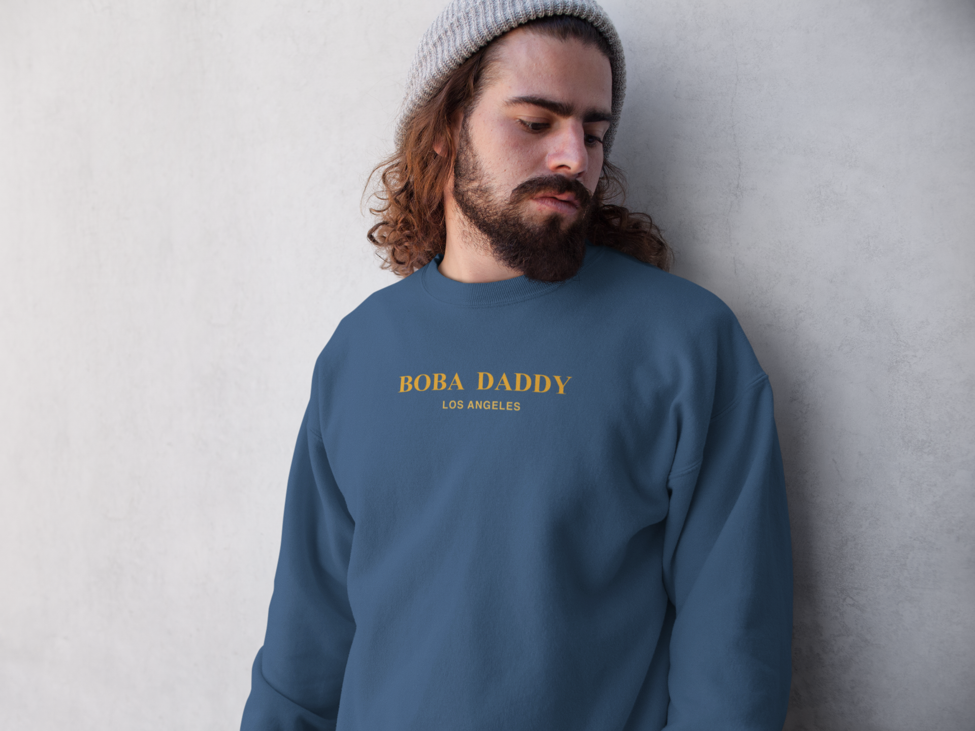 Somber man wearing a Boba Daddy Sweater