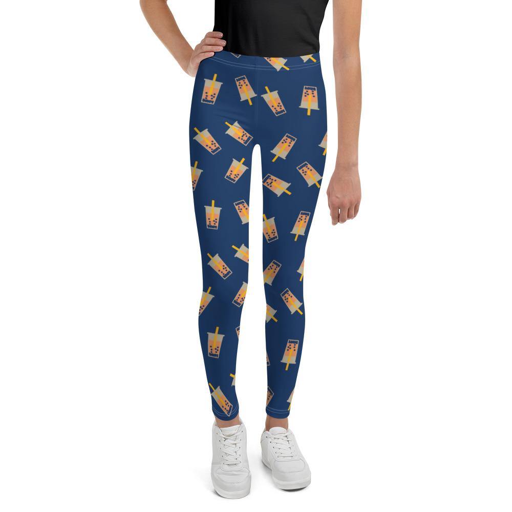 Kid wearing Boba Leggings and White Sneakers