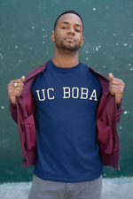 Man wearing UC Boba School Shirt