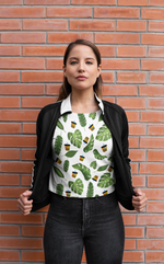 Woman wearing Boba Leaves Shirt against a Brick Wall