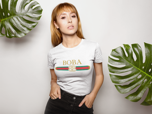 Gucci Parody Boba Shirt worn by a woman against a backdrop posing - Designer Boba Shirt
