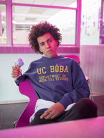 Man wearing a UC Boba Sweater in Front of an Ice Cream Shop