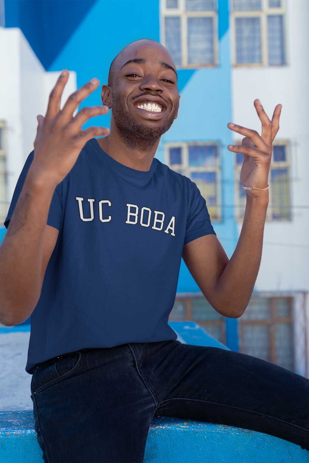 Happy man wearing UC Boba School Shirt 
