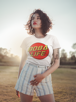 Woman wearing a Boba Life T-Shirt against the sunset 